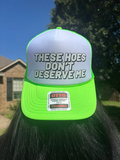 These Hoes Don't Deserve Me Trucker Hat