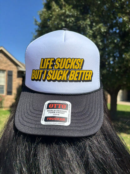 Life Sucks But I Suck Better Trucker Hat